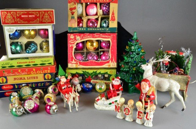 COLLECTION OF VINTAGE CHRISTMAS DECORATIONS: Collection of 1950's holiday items including six boxes of antique Christmas lights, six boxes of antique Christmas ornaments, set of NOEL candleholders, ceramic Christmas tree with plastic pegged ligh