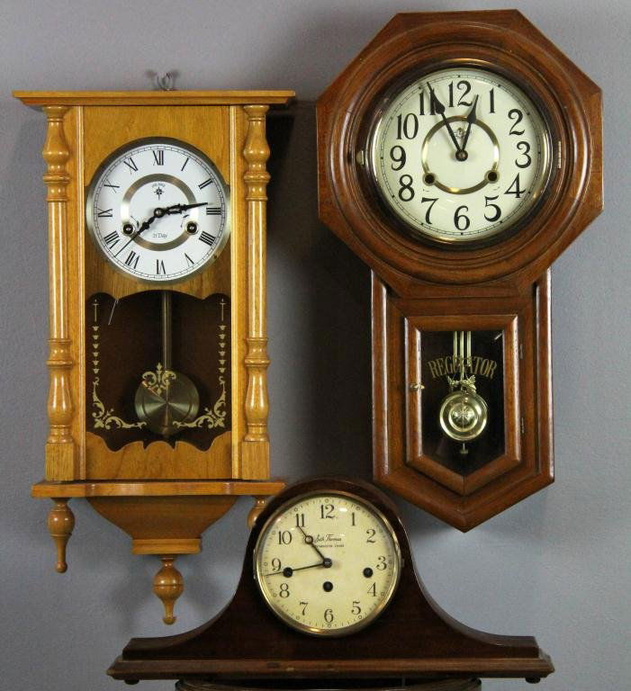 (3) Clocks including Seth Thomas Mantle Clock: Consisting of a D.A. Regulator wall clock and a Polaris 31-day wall clock, largest is 23" H, circa mid-20th century, condition varies.