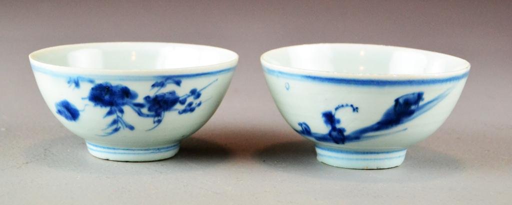Pr. Chinese Blue & White (Kraak) Porcelain Bowls: Finely painted with simple floral sprays on a white ground, the bowls with raised foot ring each with concentric circle in underglaze blue, circa 1640 late Ming Dynasty, 11.5 cm D, Private collection 