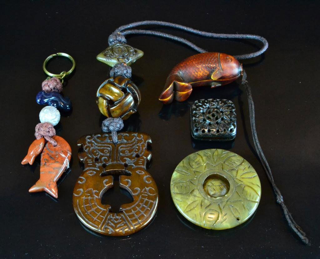 (5) Pcs. Chinese Archaic Jade Items: To include large square reticulated stone bead, keychain with carved stone beads and fish, pendant with carved knotted bead, carved puzzle disc, along with erotic composite pendant, largest is 11" L,