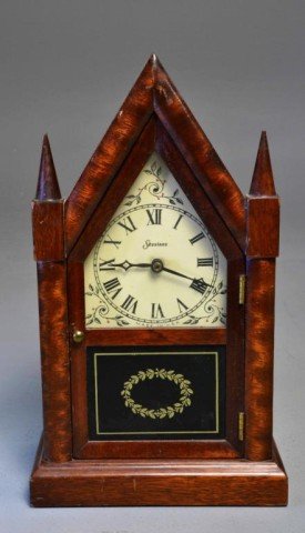 Sessions Electric Mantel Clock: Circa 1940's Sessions electric mantel clock, model 2w, stepple design with ivory colored face, Roman Numerals, glass door with gold wreath design, made in U.S.A.. Private collection Rochester Hills, M