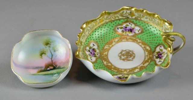 (2) PCS. NIPPON BOWLS: Including 4" hand-painted bowl of lake scene with swan (chipped) along with 7" candy dish with gold decoration, hand painted violets in cartouches, one handle painted gold (repaired crack) Private col