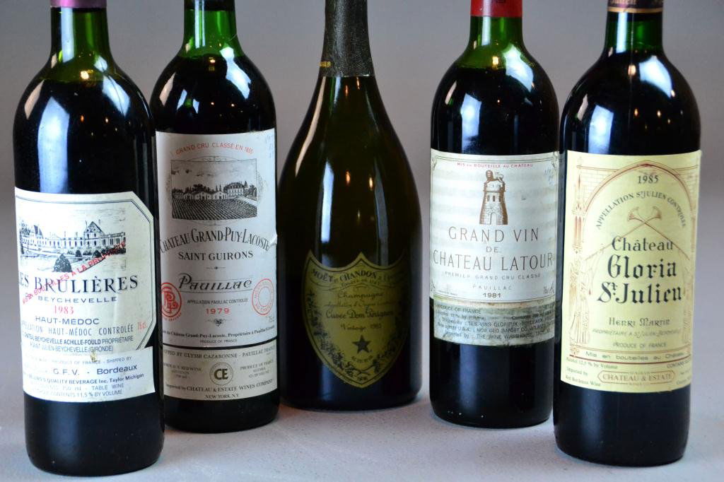 (5) Bottles Of Various French Wine: To include a 1979 Chateau Grand Puy Lacoste, a 1981 Grand Vin De Chateau Latour, 1983 Les Brulieres, 1985 Cuvee Dom Perignon, 1985 Chateau Gloria St. Julien. The largest is 750 ML.