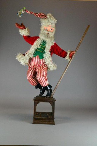 MID-CENTURY SANTA DISPLAY FROM PORT HURON: Christmas season memorabilia 1940's, colorful Santa Claus window display with striped pants, 48" h. x 32 w. on 10" square wooden base. Private collection Metamora, MI.
