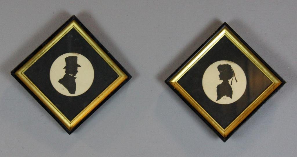 Pair of Framed Silhouettes by Sidney Zolton Lucas: Depicting a gentleman and lady, printed by the Paris Etching Society, marked LL copyright SZL in circle, 6.75” square gilt and black frames, circa late 19th century, overall good condition with smal