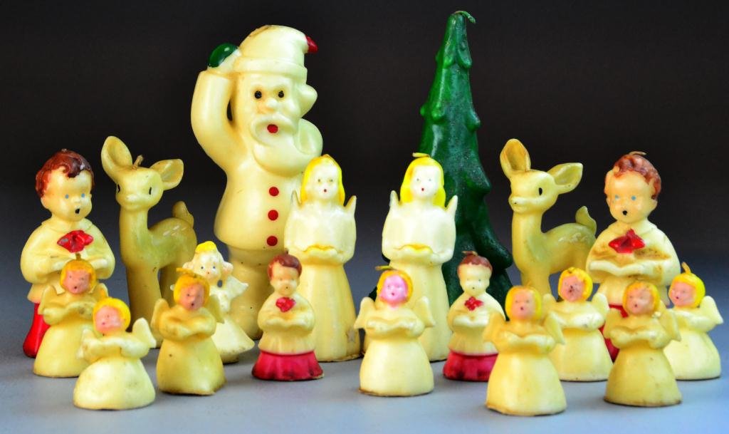 (19) Pcs. Tavern Novelty Christmas Candles: To include various Novelty Christmas candles in shapes of angels, Christmas trees, Santa Claus and reindeer, some with original boxes, largest is 7.35" H, circa mid 20th century, overall good conditio
