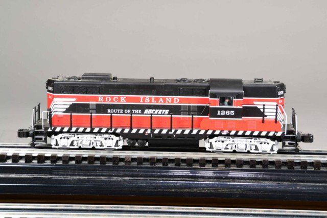 LIONEL ROCK ISLAND DIESEL LOCOMOTIVE: Rock Island GP-7 Diesel Locomotive, (#6-28565), painted black with red and white lettering and logo, rail sounds, speed control and two motors, directional lighting and electro couplers, 14" L, new in