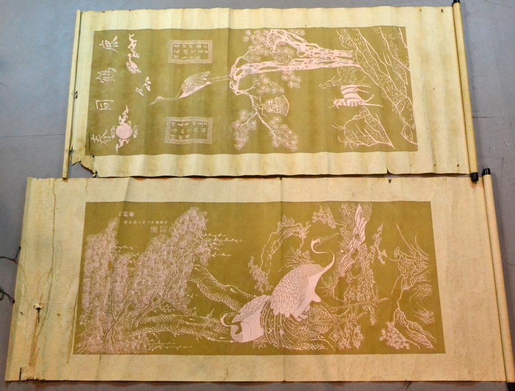 (2) Japanese Watercolor Scroll Paintings: To include a scroll painting of a crane in a tree, with a deer and horse at the base, with two chopmarks. Also a depiction of two cranes at a stream with trees in the background, signed upper right, b