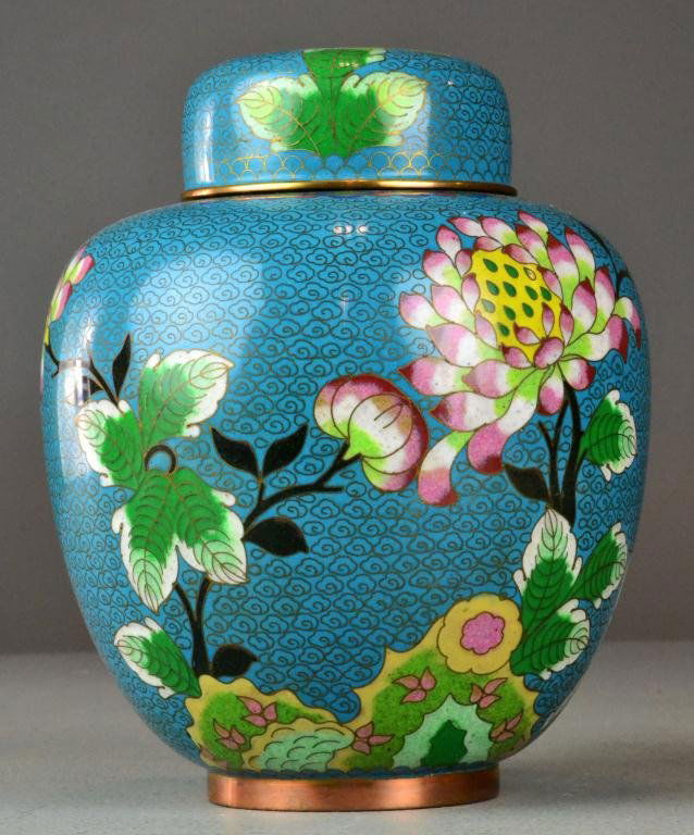 Chinese Cloissonne Covered Ginger Jar: Depicting cherry blossom and chrysanthemum decoration on turquoise ground, raised on copper foot,circa early 20th century, 9" H x 7" Diameter, good condition. Private collection Grand Rapids, MI.