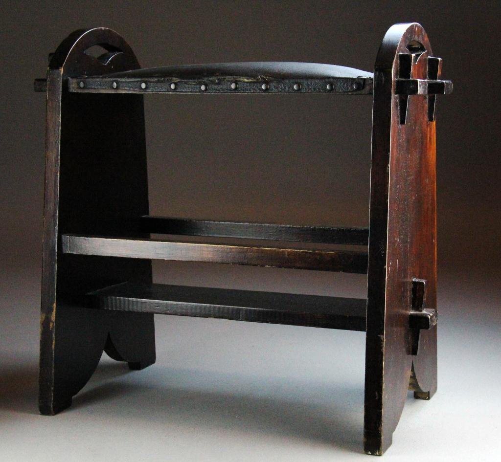 A Fine Arts & Crafts Stickley Style Leather Bench: Mahagony pegged (wedge) mortised to sides with keyed through - tennons, one shelf below leather-covered seat with hobnail tack edging, curved top with cutouts, possibly Gustav Stickley, circa early 20