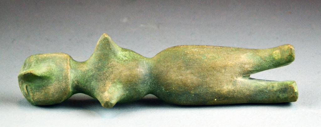 Antique Native American Stone Figure Fetish: Possibly a mound builder, depiciting a figure with facial features, with legs and very short arms, 9" H, circa 19th century or earlier.