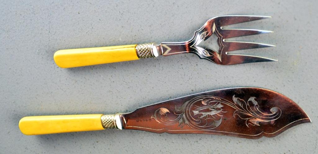 Sterling and Ivory/Bone Mounted Fish Set: With hallmarks for England, hallmarks well worn, with etched floral and scroll designs, largest measures 11.5" L, 6 ounces total weight, circa 19th century. Provenance: private collection of the late 