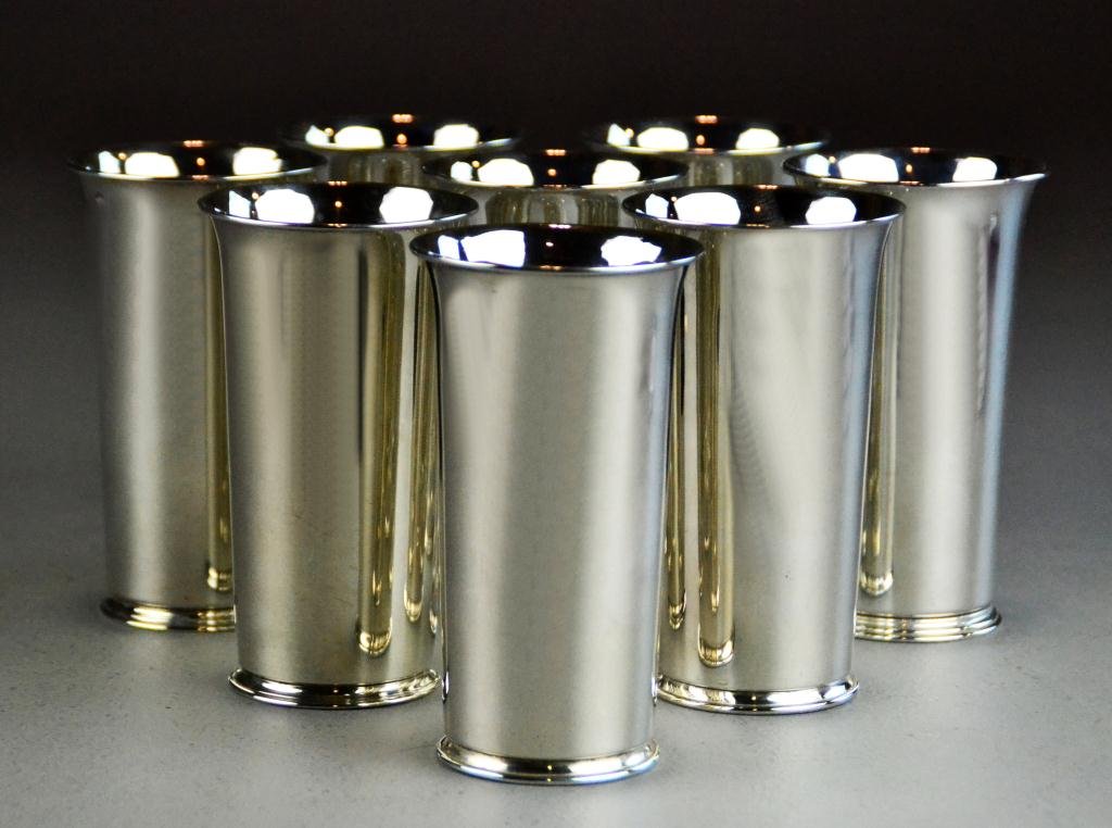 (8) Sterling Silver Julep Tumblers: Each stamped sterling 950, 5.375" H, total weight 28 Troy ounces, circa early to mid-20th century, excellent condition. Provenance: private collection of the late Wm. Stewart, VP of TWA (Trans World A
