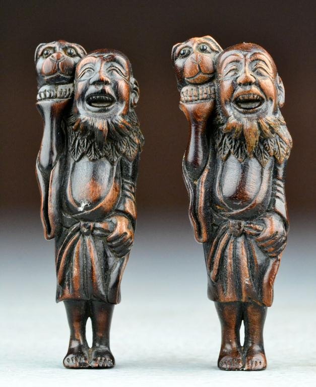 (2) Japanese Meji Period Carved Rosewood Netsuke: To include two examples finely carved to depict an elder with a chi-long on his back, both with the same two character mark to bottom left foot, 3.25"H each. Property of a Holly MI Gentleman.