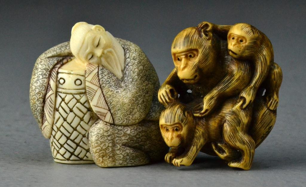 (2) Japanese Carved Ivory Netsuke: To include a well carved grouping of monkeys together with an example depicting a sleeping elder, both with two character mark, tallest is 1.5"H Important Traverse City Michigan Collection.
