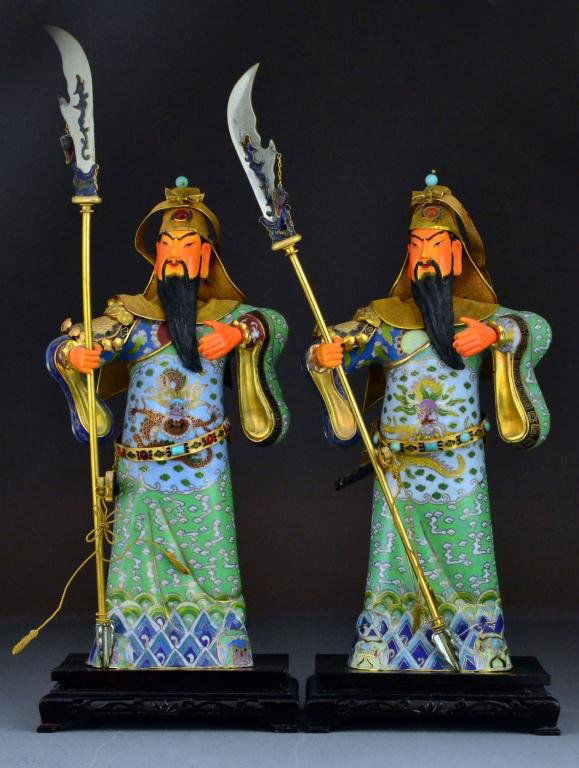 Pr. Chinese Gilt Silver, Cloisonné, & Ivory Warrior: Depicting two standing warriors each holding a Guan Dao, inlaid with turquoise and semi precious stones, raised on carved hardwood stands, 13"H not including stands, circa late 19th century. Important