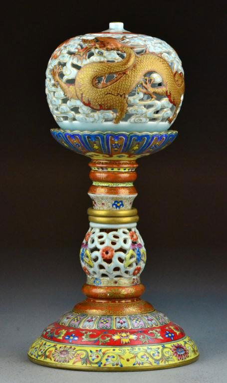Chinese Famille Rose Porcelain Censor & Stand: A pumpkin shaped censor finely molded and enameled to depict dragons chasing a flaming pearl, the stand decorated en suit against a yellow, raspberry, and turquoise ground, the base with blue enamel s