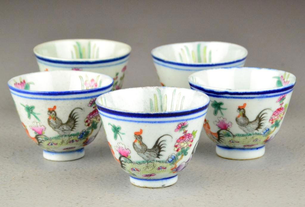 (5) Chinese Qing Famille Rose Tea Cups: Finely painted to depict roosters, the interior with lotus blossoms, with red seal to foot rim, 2"H, circa 19th century. Important West Bloomfield Michigan Collection.