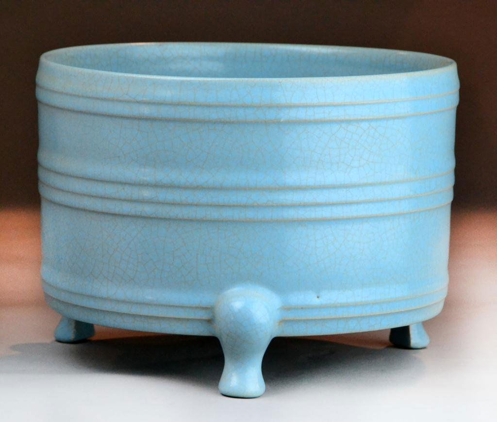 Chinese Longquan Porcelain Tripod Censor: Of archaic bronze form with incised line to the body, raised on three shaped feet, the hole covered in a robin's egg blue glaze, with three groups of incised lines and unusual four character mark to f