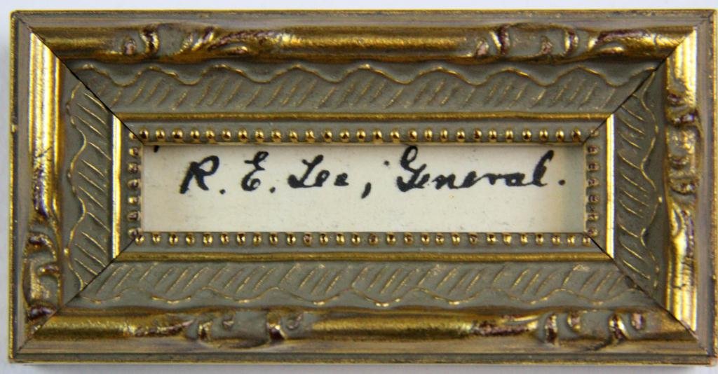 Robert E. Lee Framed Signature: Signed R. Lee, General., nicely framed in giltwood floral and scroll minature frame, 1.5" H x 3.75" W, framed.