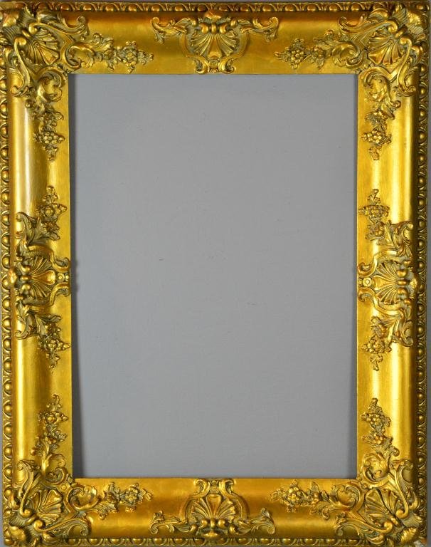 Antique Rococo Gilt Frame: Elaborately carved frame, exterior measurement 37" x 29, interior measurement 28.5" x 20.5", some losses. Collection of Troy Michigan lady.