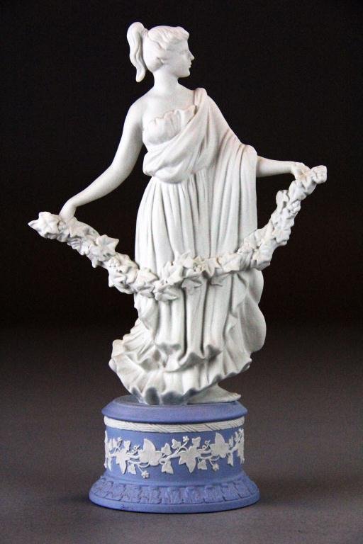 Wedgewood Jasperware "Ivy Garland" Figure: White on pale blue jasperware from "The Dancing Hours Collection", depicting goddess holding a garland of ivy, #1119 in limited edition, third in a series with COA, 10.5" H, impressed mark on bottom,