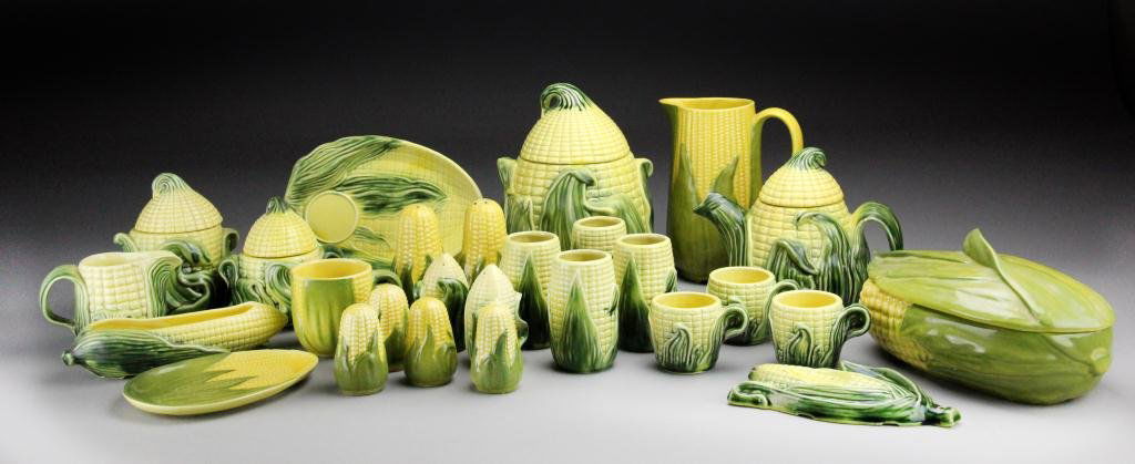 (34) Shawnee Pottery - Corn Pattern Dinnerware: To include Shawnee and Stanford corn cob pattern dinnerware: salt shakers, cups, cream & sugar teapot, tumblers, soup tureen, butter holder, spoon rest and other containers, circa 20th century, excell