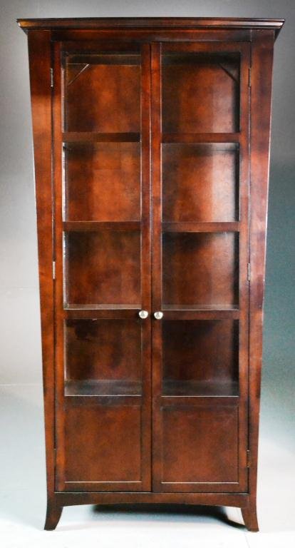 Stickley Style Curio Cabinet: Having round curved top, two glass doors and glass side panels, interior lighting, three shelves,78" H x 38" W x 20" D, circa 20th century, good condition. Private collection of Charlevoix, Michigan l
