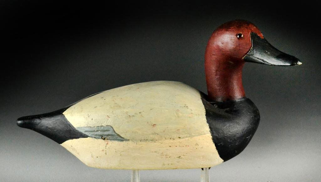 Canvasback Duck Decoy: Original paint with red glass eyes, lead weight to bottom, 14" L, circa 20th century, good condition. Private collection of Rochester Hills, Michigan gentleman.