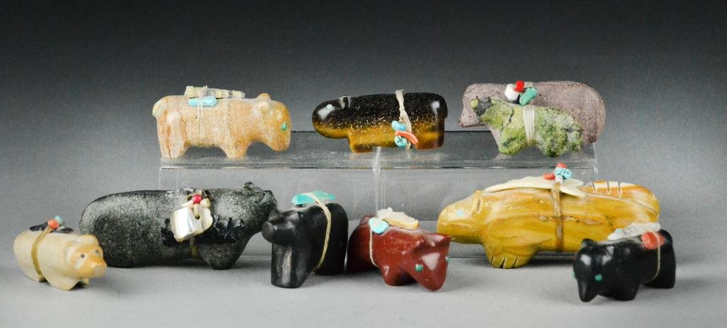 (9) Finelly Carved Zuni Effigies: Carved to depict various animals, in various stones including cats eye all wrapped in sinus and hung with turquoise, coral and various other stones some resembeling arrowheads or spear tips, largest m