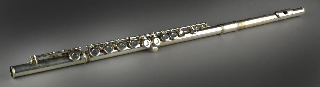 Gemeinhardt Flute with Case: Musical instrumen in velvet-lined case, flute is 26" L, circa 20th century, good condition. Property of a Lake Orion, Michigan lady.