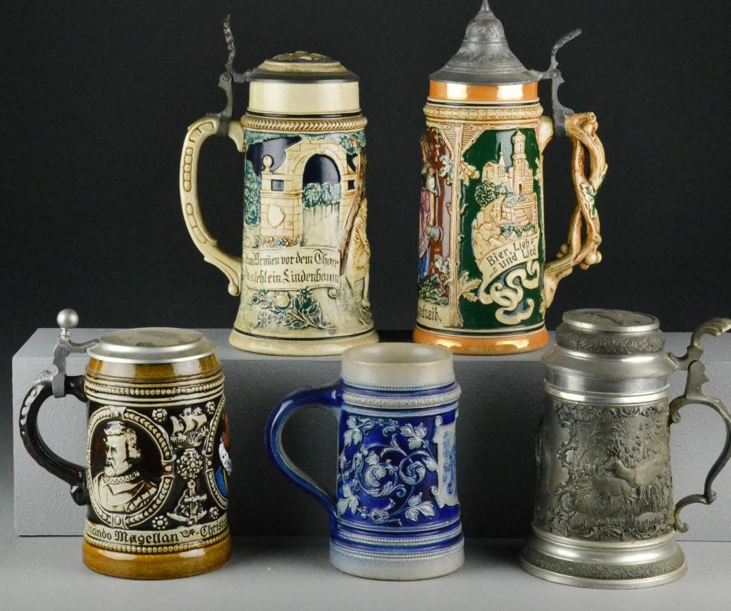 (5) Stoneware & Pewter Beer Steins: To include a Christopher Columbus stein, a pewter woodland scenic stein J138 with stags, a cobalt glazed 'Prosit' stein, a lover's stein (largest is 10" H), circa 20th century, good condition. Estate 
