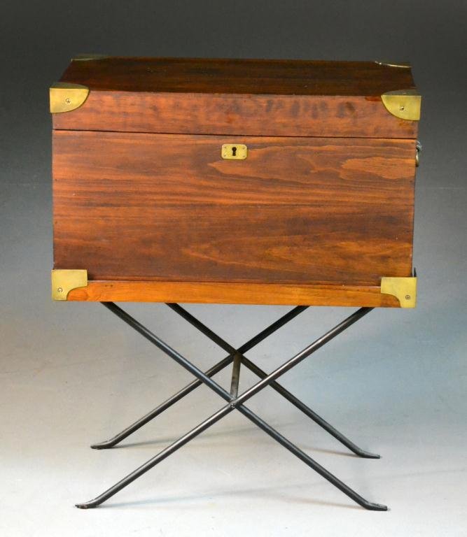 Chinese Wooden Lapdesk and Stand: Brass-cornered wooden cabinet raised on folding metal feet, brass escutcheon, lifts to open revealing letter holders, writing surface which also lifts to reveal sliding storage compartments, 24" H wit