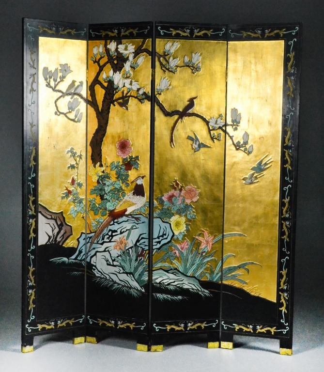 Chinese Coromandel Screen: Carved bird and floral decoration to one side, elaborately carved garden scene with gilt background to the reverse, 72.5" H x 64" W x 1" D (16" each panel) circa 20th century, good condition. Estate o
