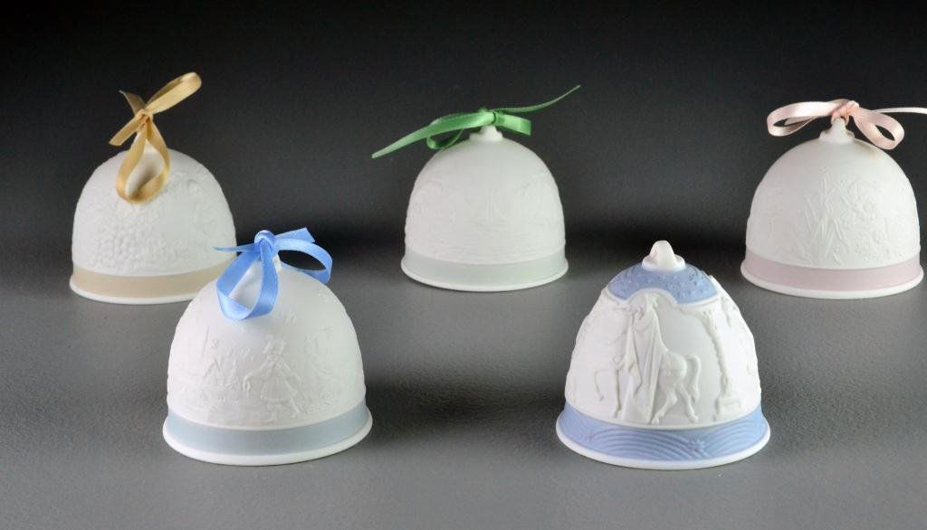 (5) Lladro Porcelain Bells: To include Christmas, Summer, Spring, Winter and Fall decorated porcelain bells, 4.5" H, excellent condition in original boxes. Estate of Eugenia Sager, Plymouth, Michigan.