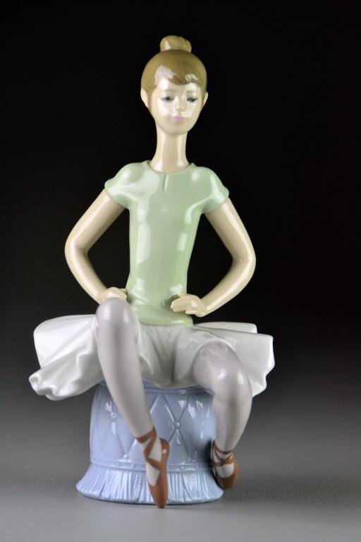 Lladro Porcelain Figurine "Ballet Green #5": #1360 Depicting a seated female ballet dancer, dated 1978 with blue mark to bottom, excellent condition in original box. Estate of Eugenia Sager, Plymouth, Michigan.