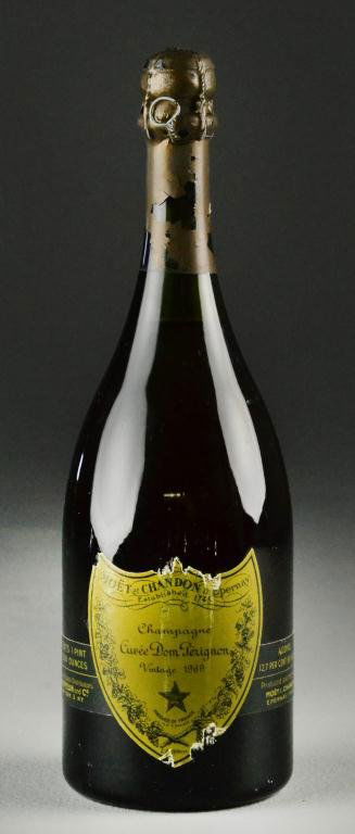 1969 Dom Perignon Champagne: 1969 Dom Perignon Champagne, as is. Condition: Unopened. Loss to foil seal noted. Auctioneer's Note: We can not guarantee the details of storage. Property of a Royal Oak, Michigan Gentleman.