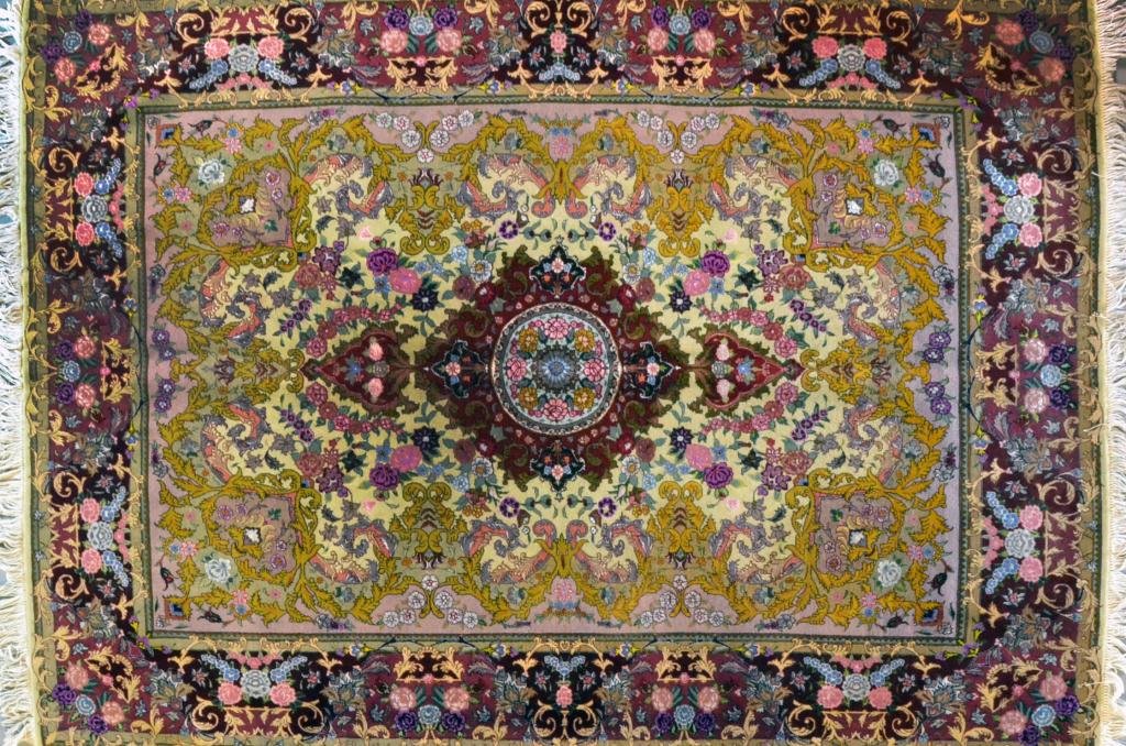 A Fine Persian Tabriz Silk And Wool Rug: Woven in the classical medallion pattern in multiple colors, and a beautiful rug,480 knot/sq. inch, 5'3" W x 7'L, Circa mid 20th century. Property of a Troy Michigan Lady.