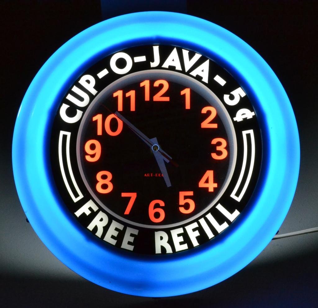 Neon Coffee Advertisement Clock: Cobalt and white wall hanging clock, "Have a cup of Joe, Coffee 5 cents," electrified, 14" Diameter, good condition. Property of David and Carol Walker, Sterling Heights, Michigan.