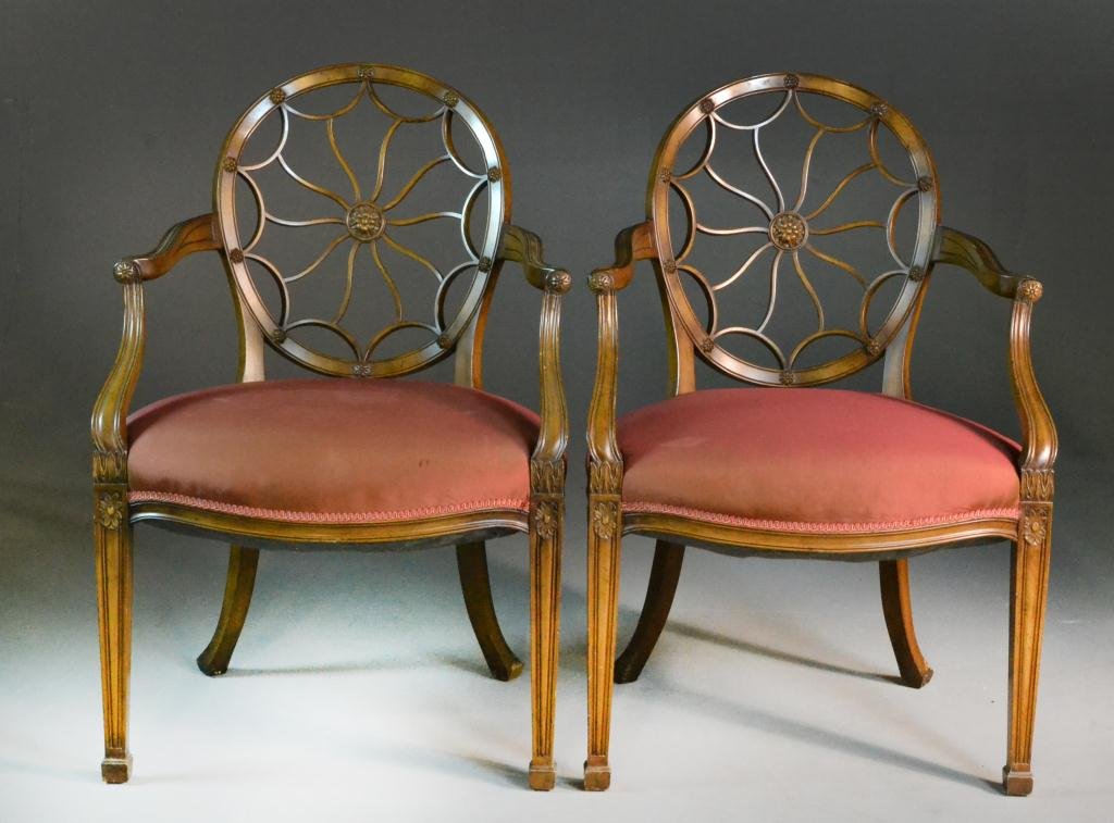 (2) George III Style Mahogany Umbrella Back Chair: In French Hepplewhite taste, with a central floral medallion, crest rails carved with bell flowers, wide upholstered seats with tapering square ribbed legs, 38" H x 25" W x 22" D, 20th century, good c