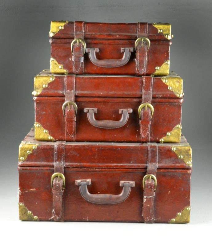 (3) Brass & Leather Graduated Luggage: Set of small leather luggage with straps , circa 20th century, 8" H x 12" W x 17" L, good condition. Property of David and Carol Walker, Sterling Heights, Michigan.