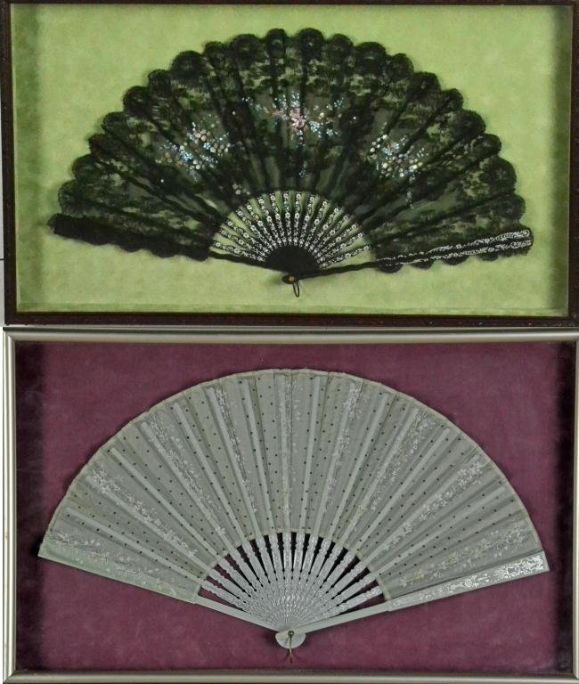 (2) Fans Displayed in Shadowboxes: To include a pale green painted silk fan along with painted black Chantilly lace fan with ebony sticks, largest is 3" D x 18" H x 30" W, both in good condition. Property of David and Carol Walker, Ste