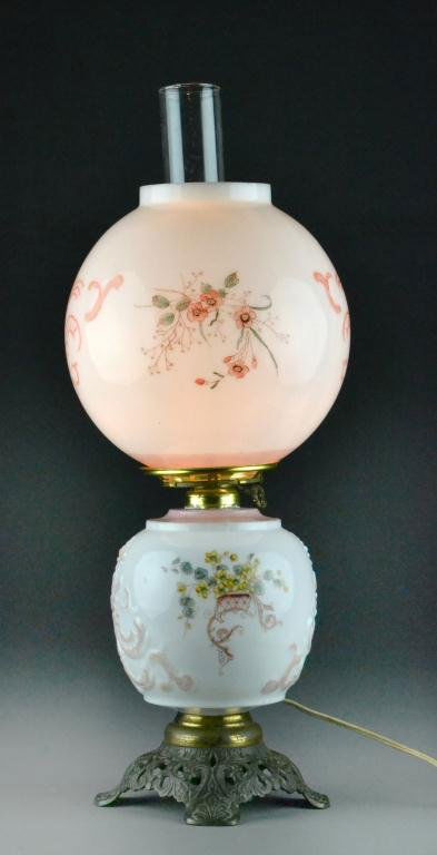 Gone With The Wind Style Budoir Lamp: Having a glass resevoir and shade painted with flowers raised on brass base now electrified, 22.5" H, circa early to mid 20th century. Property Of A Fort Gratiot, Michigan Gentleman