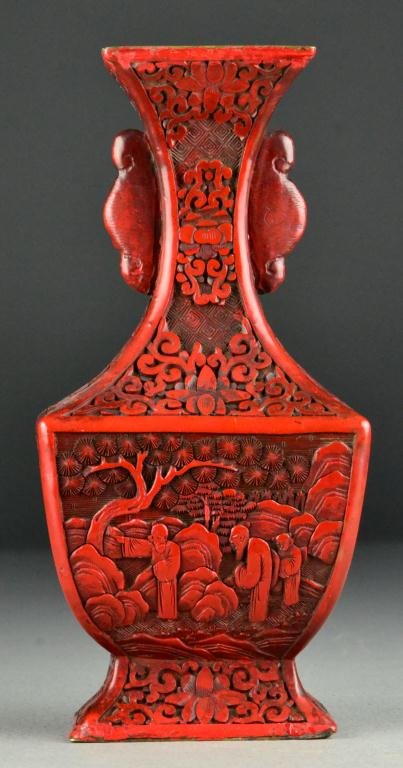 Chinese Qing Cinnabar Lacquere Vase: Of archaic bronze form, carved to depict figures within a landscape to both sides, 10"H, circa late19th century. ,br>Important West Bloomfield Michigan Collection.