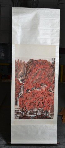 Chinese Silk Scroll Painting signed Li Keran: Watercolor scroll painting mounted on silk depicting a mountain scene with trees in bloom, Li Keran signed at top right, 80" L x 28.5" W, circa 20th century. Private collection Rochester Hills, MI.