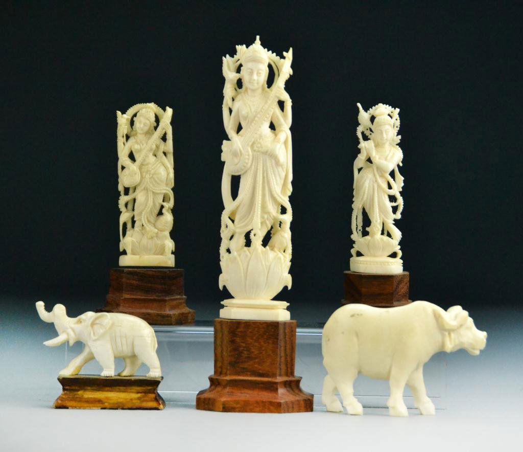 (5) Indian Carved Ivories: To include three goddess together with a water buffalo and an elephant, largest is 6.5"H including stand, circa early 20th century. Important Grosse Pointe Shores Michigan Collection.