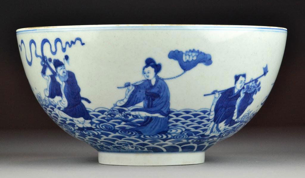 Chinese Blue and White Porcelain Tall Bowl: Depicting the eight immortals atop crashing waves, the interior painted to depict Shou symbol amongst ruyi clouds, with six character mark in underglazed blue within two concentric circles to footrim,