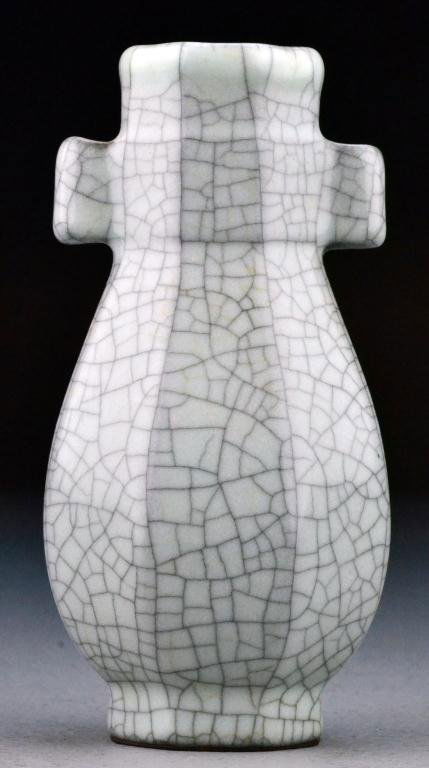 Chinese Ge-Type Porcelain Vase: With faceted body covered all over in crackle glaze, with tubular handles, unsigned but with old paper label, 5.75"H, circa late 19th/early 20th century. Important West Bloomfield Michigan Collection.