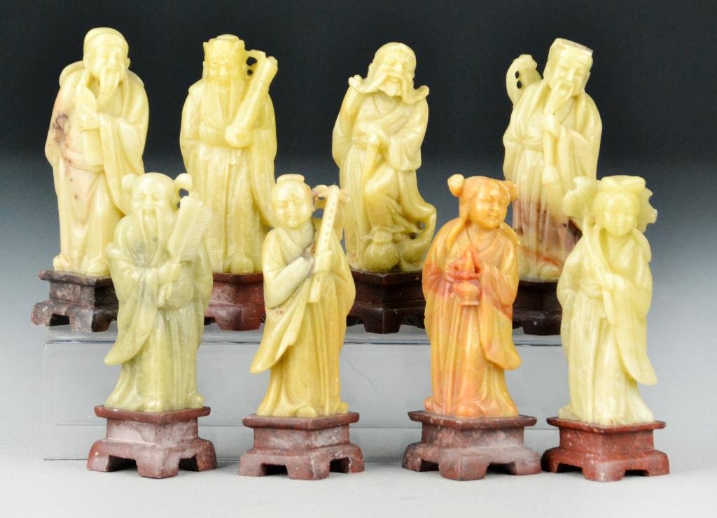 (8) Chinese Carved Soapstone Immortals: Each finely carved to depict one of the eight immortals raised on soapstone stand, 3" H average, circa early 20th century. Property Of A Birmingham, Michigan Gentleman.
