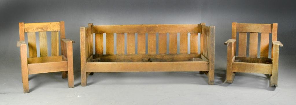 (3) Pc. Arts & Crafts Period Stickley Style Suite: To include an oak Prarie-style sofa, rocker and side chair. Sofa measures 32.5" H x 71.5" L x 27.75 D, chair measures 34.5" H x 25" W x 24" D, rocker 32.5" H x 29.25" W x 24" D. Condition: all in need